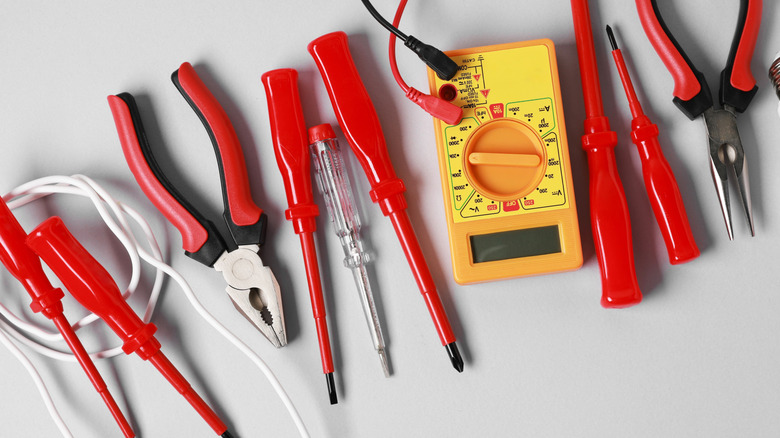 Professional insulated pliers and screwdrivers for electrical safety